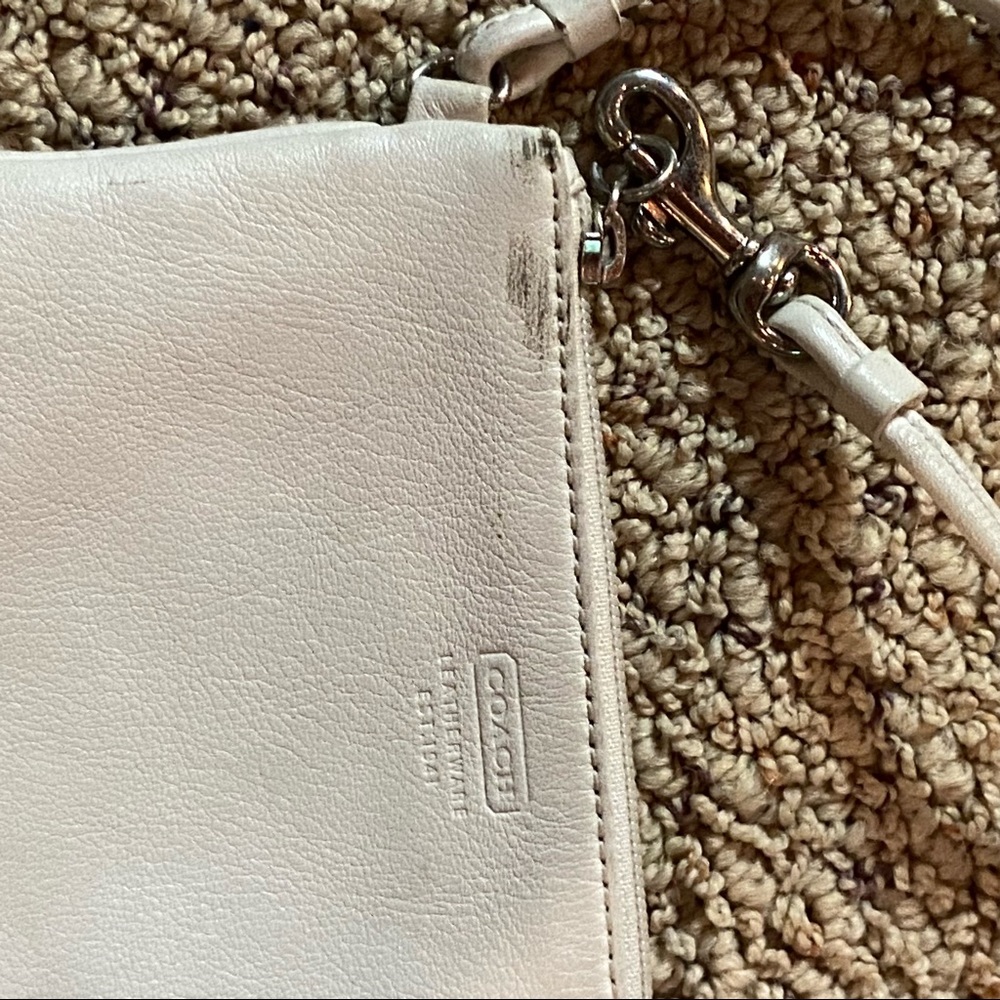 Small white coach wristlet